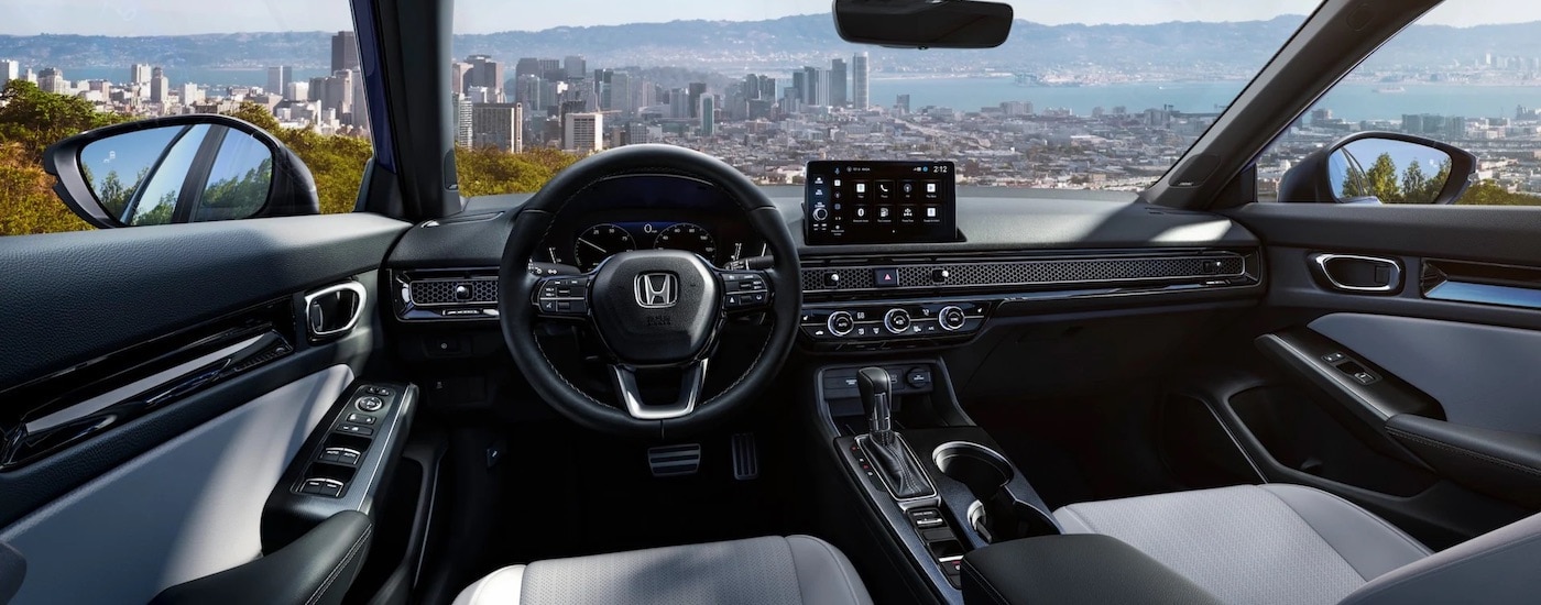 The grey interior of a 2025 Honda Civic.