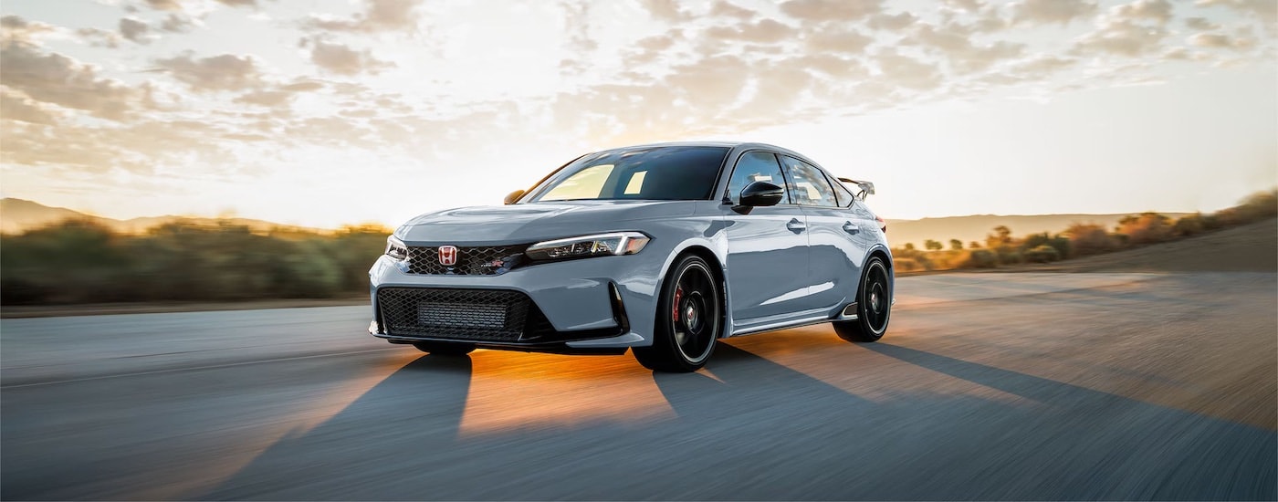 A grey 2025 Honda Civic Type R from the front at an angle.