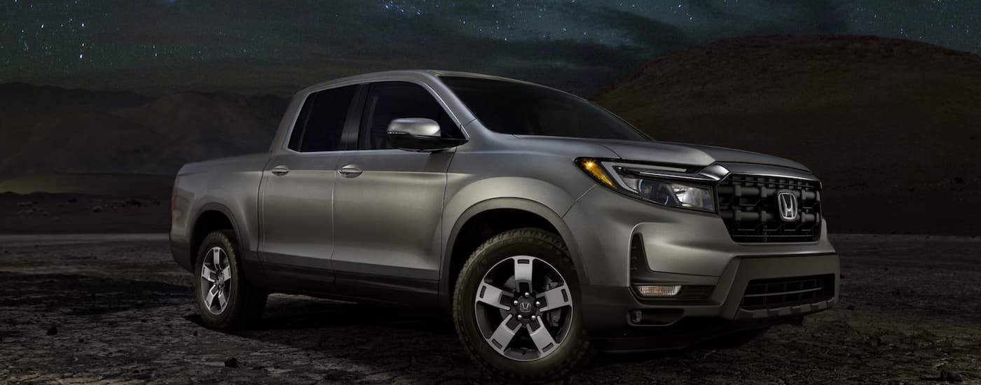 A silver 2025 Honda Ridgeline RTL parked for sale near Monroe