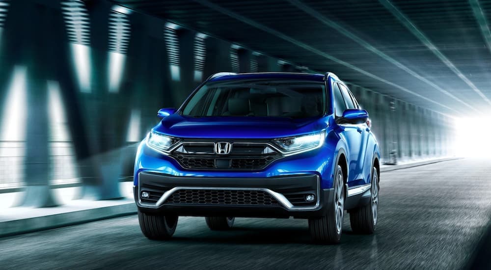 Blue 2020 Honda CR-V driving down a tunnel.