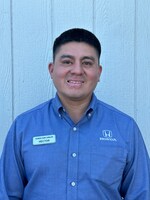 Staff member Hector Ballena from ID_f42c5f1bb608