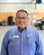 Staff member Renan Fontanilla from ID_f42c5f1bb608