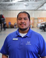 Staff member Osbaldo "Tito" Cruz from ID_f42c5f1bb608