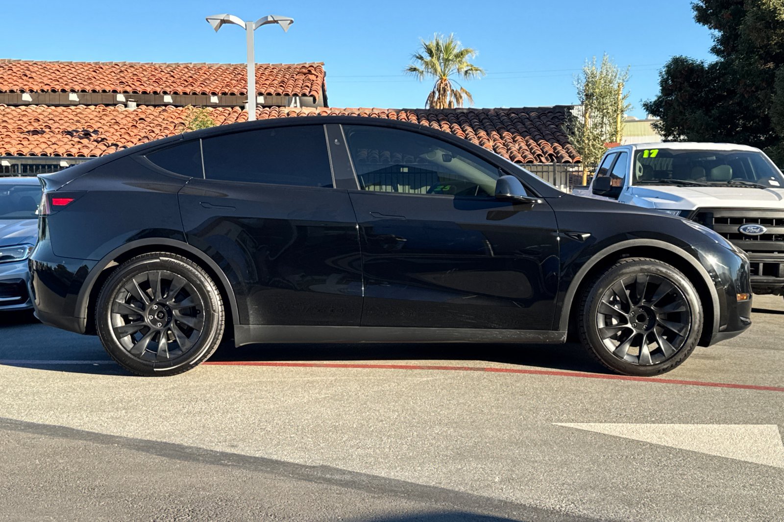 Used 2023 Tesla Model Y Base with VIN 7SAYGDEDXPF976884 for sale in San Carlos, CA
