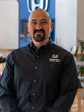 Staff member Alex Gomez from 60c2d342489c