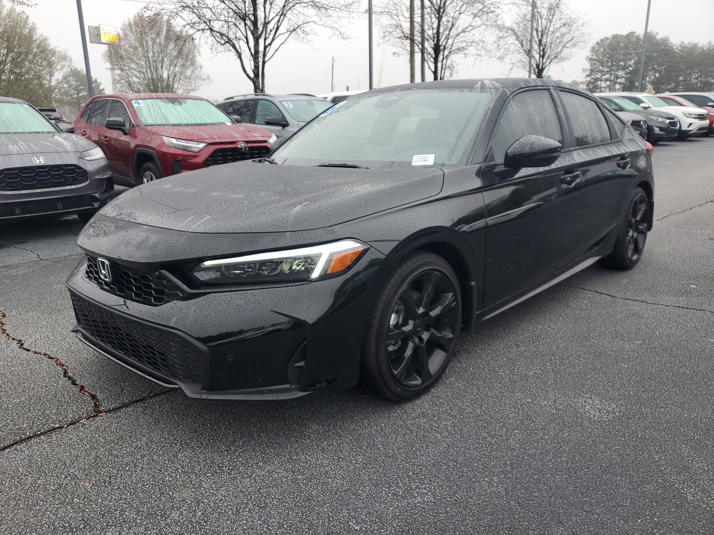 2026 Honda Civic Hatchback Hybrid Sport Touring photo 2