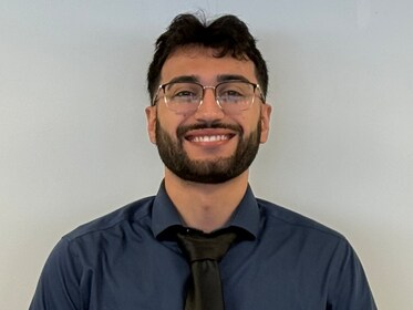 Staff member Ish Aku from ID_4330b633de12