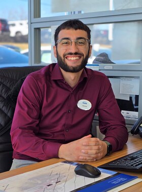 Staff member Ish Aku from ID_4330b633de12