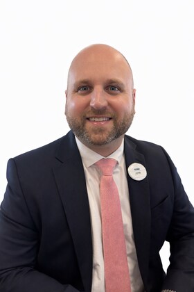 Staff member John Moore from ID_2b2a1de7fdc5