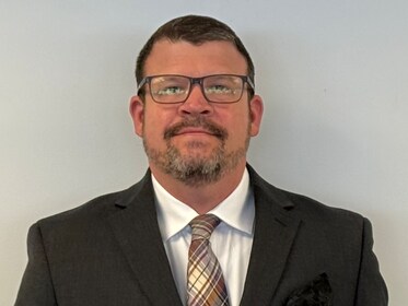 Staff member Jason Sullivan from ID_4330b633de12