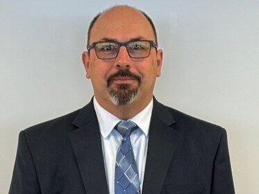 Staff member Tim Raymond from ID_4330b633de12