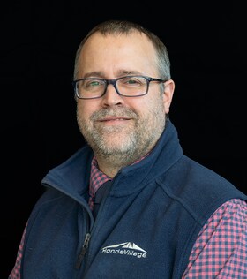 Staff member Jason Flynn from 12e1d253b416