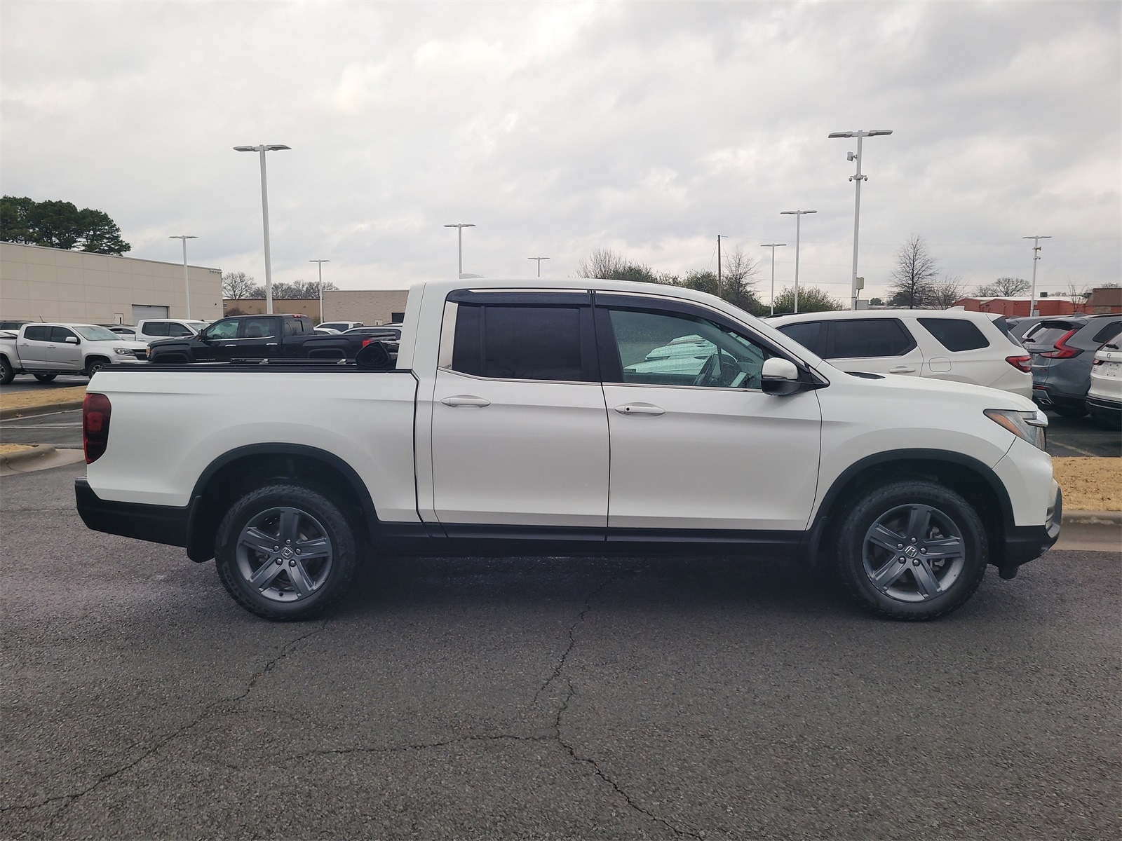 Used 2021 Honda Ridgeline RTL with VIN 5FPYK3F54MB016637 for sale in Little Rock