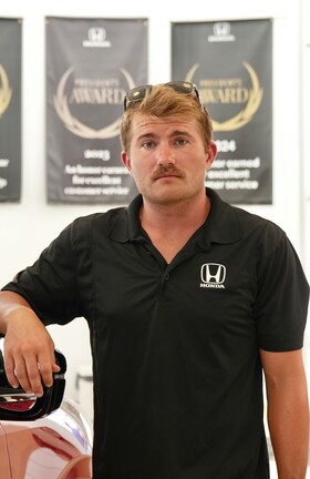 Staff member Zack Lewis from a8859d2ad8d9