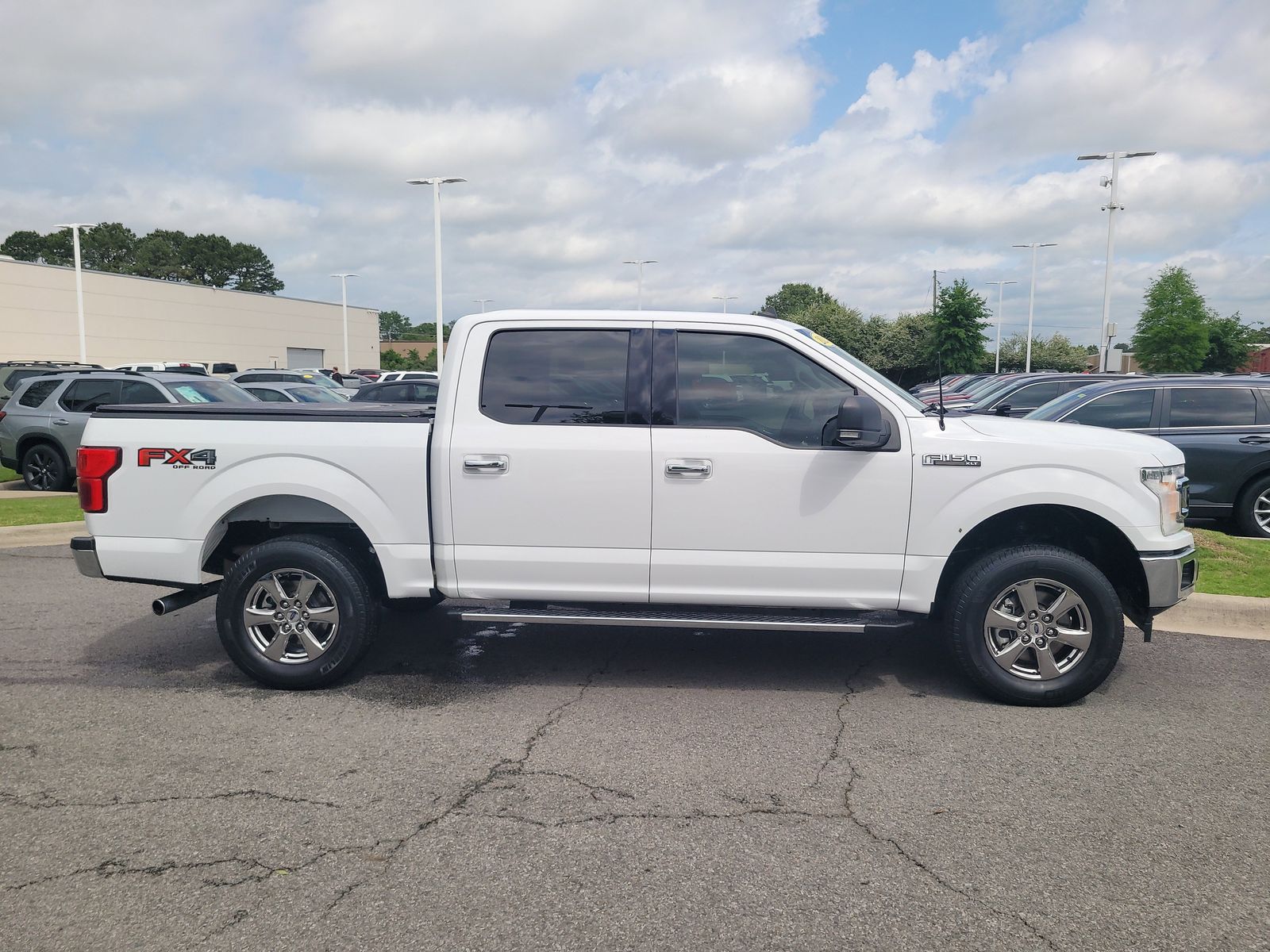 Used 2020 Ford F-150 XLT with VIN 1FTEW1E52LKE69520 for sale in Little Rock