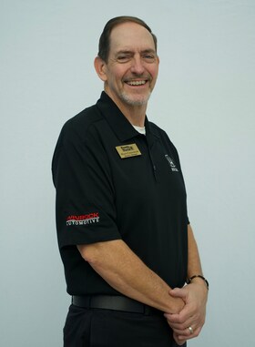 Staff member Hans Chandler from 484ad584a8de