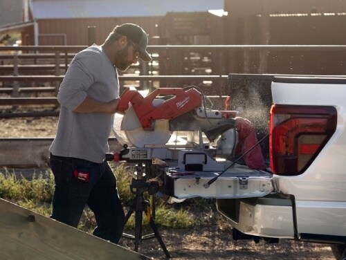 2025 Ford F-150 view of man using powertool using pro power onboard