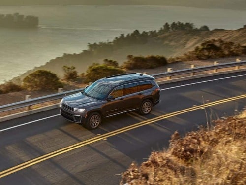 2026 Jeep Grand Cherokee driving on a highway
