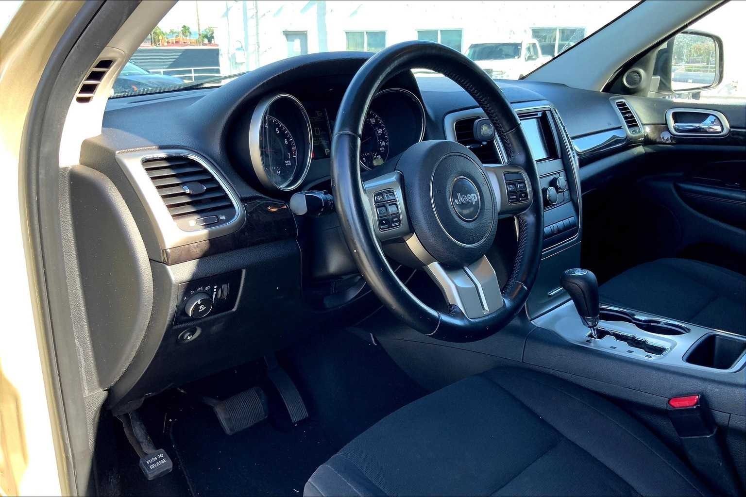 Used 2012 Jeep Grand Cherokee Laredo with VIN 1C4RJFAG5CC155472 for sale in Honolulu, HI