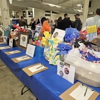Silent auction tables at Oyster Roast