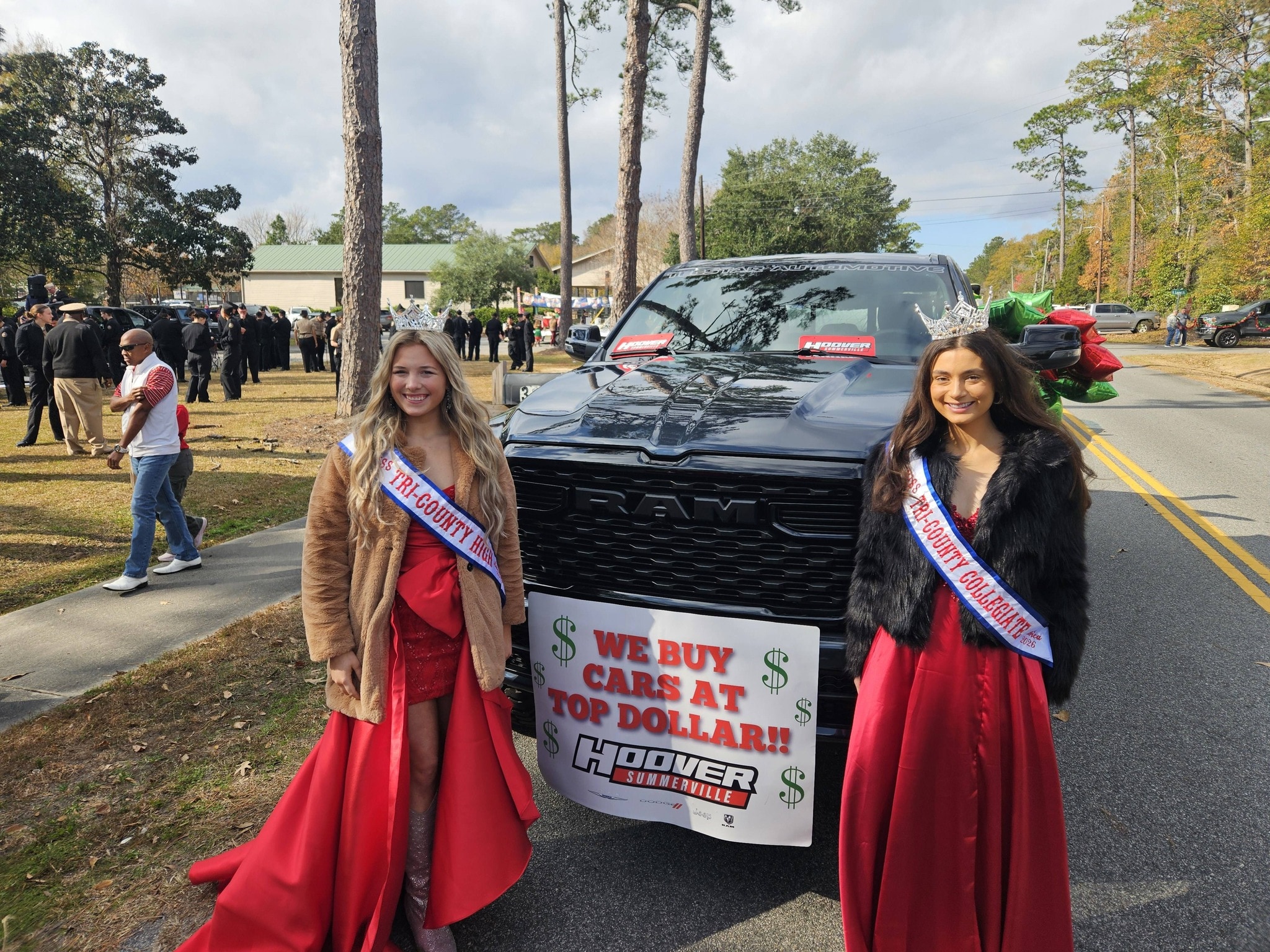 Two queens with Hoover RAM truck at Christmas Parade