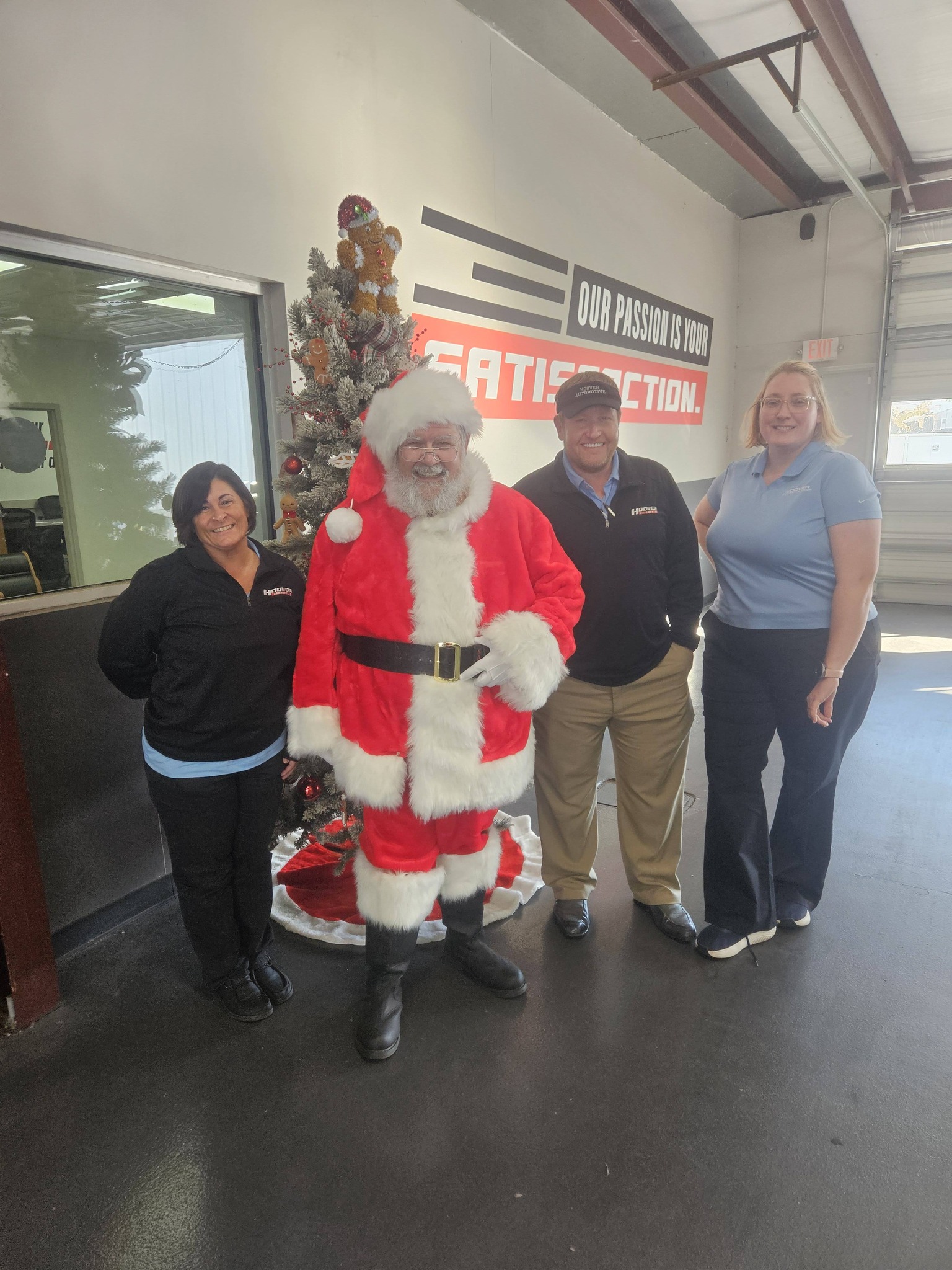 Hoover staff with Santa at dealership