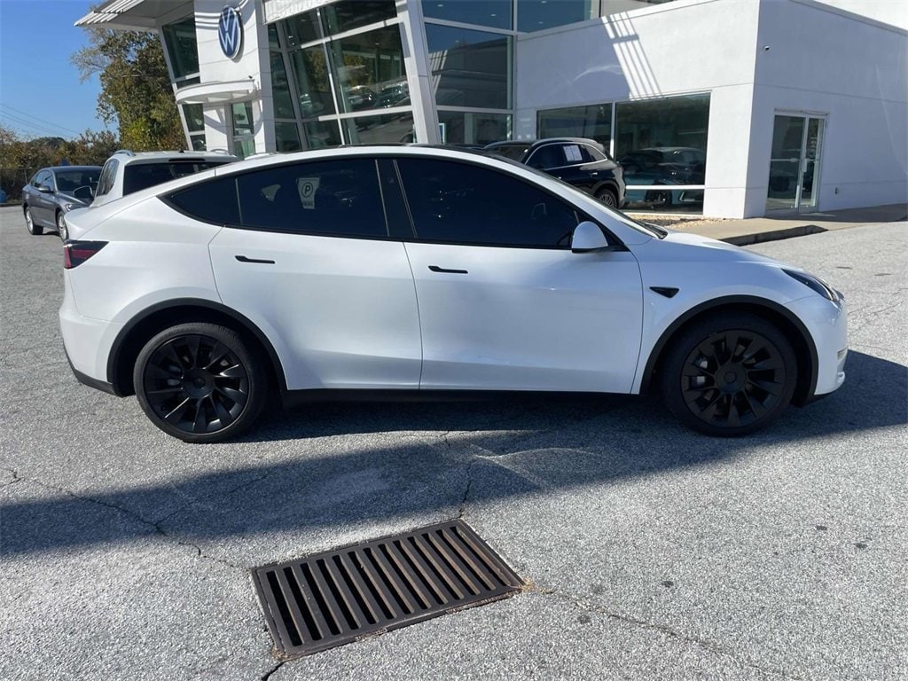 Used 2024 Tesla Model Y Long Range with VIN 7SAYGDEEXRA332052 for sale in Lithia Springs, GA