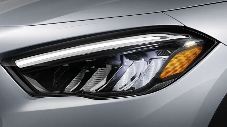 Learn about the LED Daytime Running Lamps safety feature Exterior shot of the left headlamp on the Mercedes-Benz GLA SUV