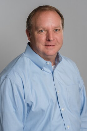 Staff member Pat Land from ID_76d346165a95