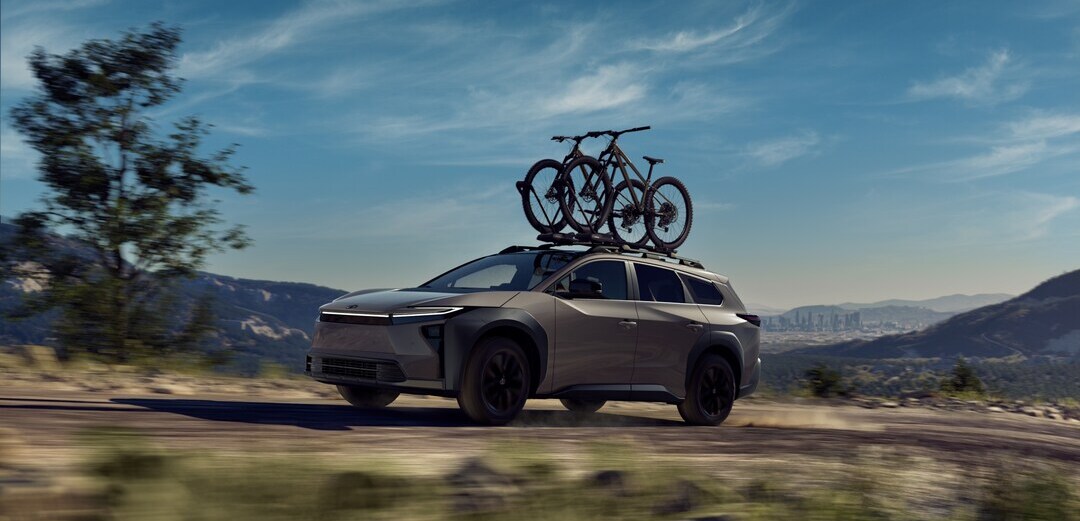  Person cheerfully signing documents.