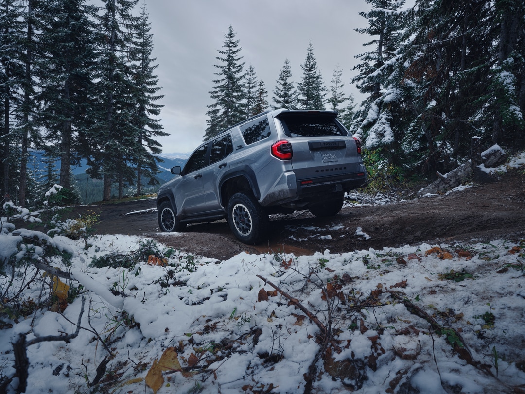 Person cheerfully signing documents.