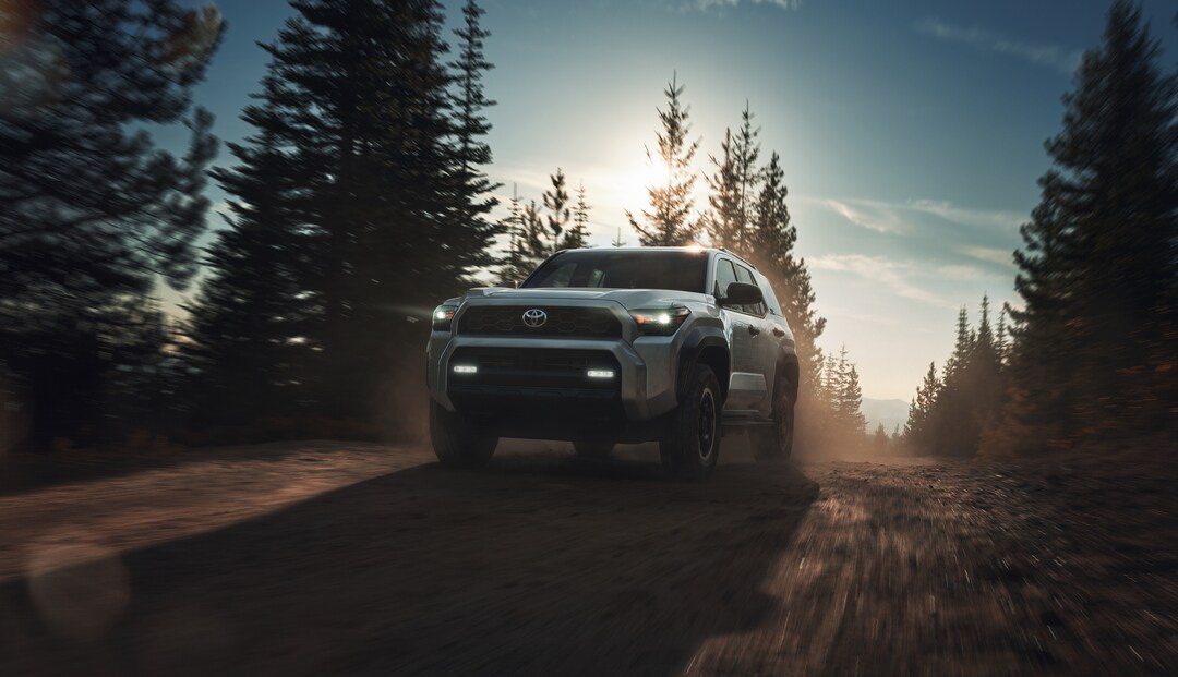  Person cheerfully signing documents.