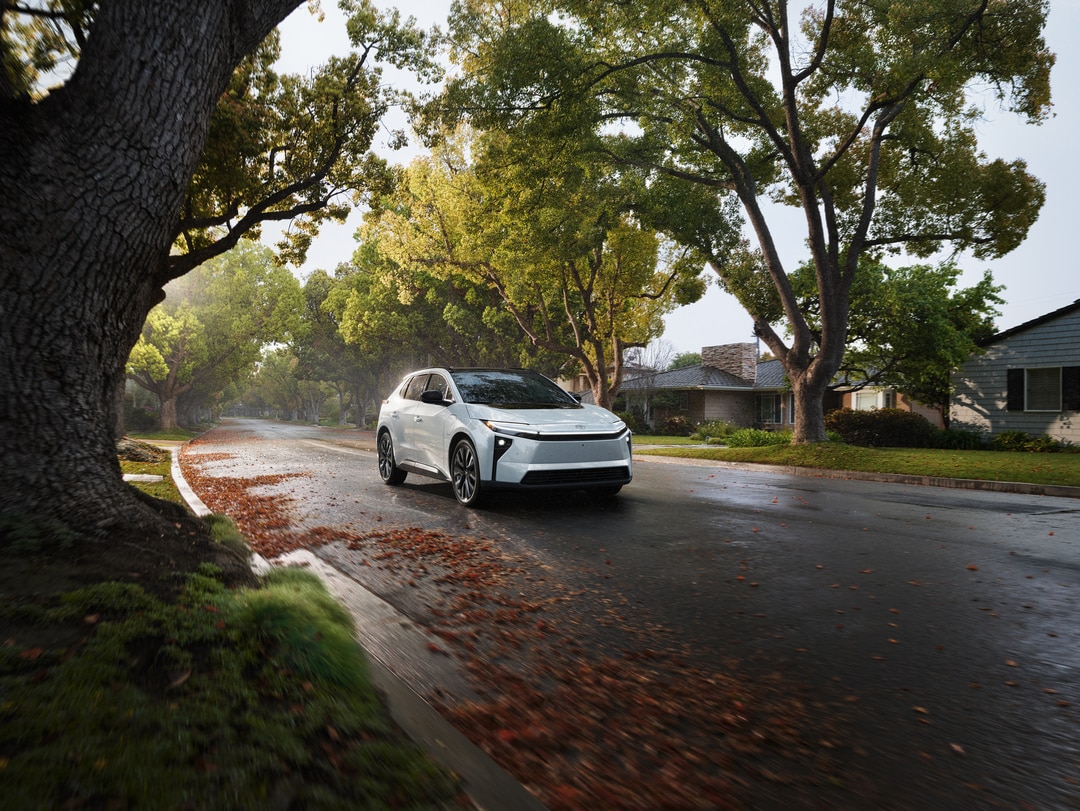  Person cheerfully signing documents.