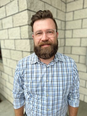 Staff member Adam Ketchum from ID_7b70d2caa85a