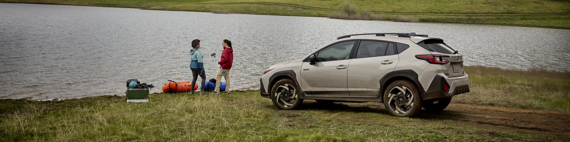 2026 Subaru Crosstrek Limited Hybrid in Sand Dune Pearl parked lakeside near Carrollton, Ohio