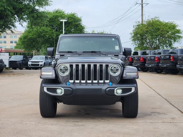 Certified 2022 Jeep Wrangler Unlimited Sahara 4XE with VIN 1C4JJXP61NW186785 for sale in Plano, TX