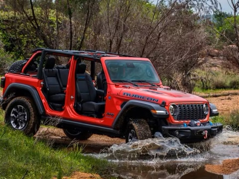 red 2025 jeep wrangler SUV going off road in plano, tx