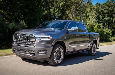 grey 2027 RAM 1500 truck driving down the road