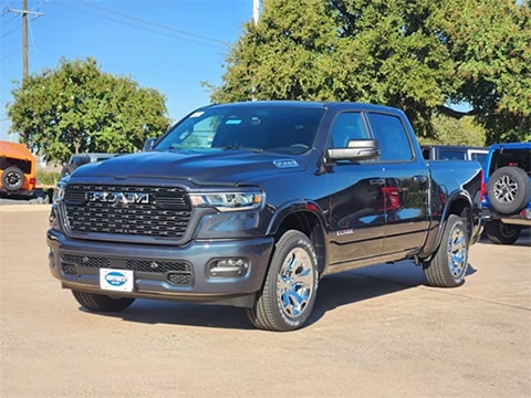 gray 2026 RAM 1500 truck parked at the Huffines CDJR Plano dealership in Plano, TX