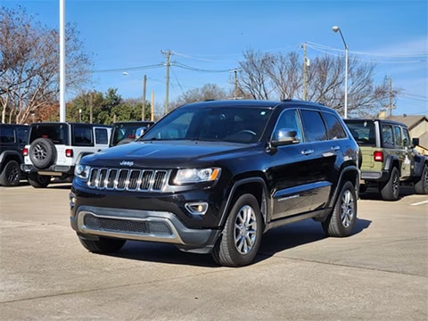 used 2015 Jeep grand cherokee SUV parked at the Huffines CDJR Plano dealership in Plano, TX