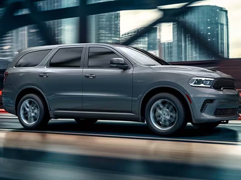 grey 2025 Dodge Durango SUV driving down the road
