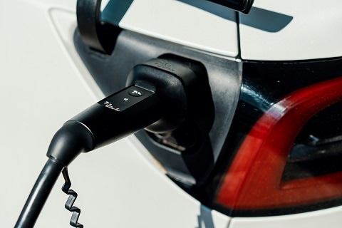 an EV getting charged at a station in plano, TX