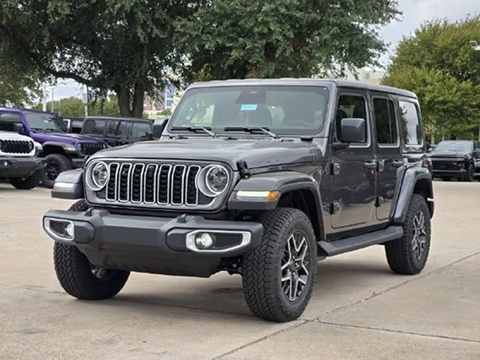 grey 2027 Jeep Wrangler SUV parked at the Huffines CDJR Plano dealership in Plano, TX