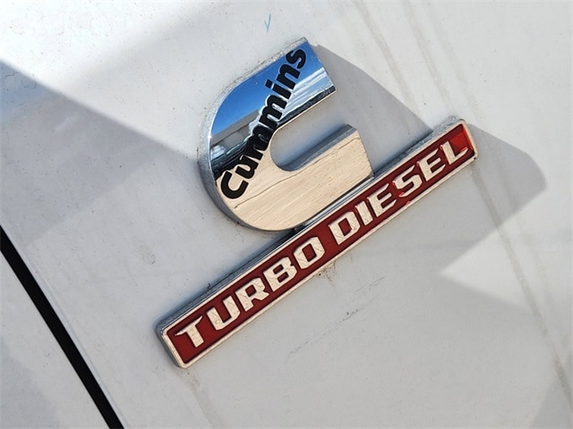 Cummins diesel emblem on a truck parked at the Huffines CDJR Plano dealership in Plano, TX