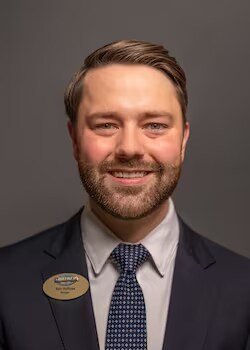 Staff member Sam Huffines from ID_d1ccd3