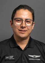 Staff member Miguel Lopez from ID_436af5e58fb7
