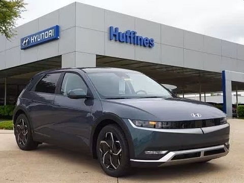 green 2024 hyundai ioniq 5 electric crossover parked at Huffines Hyundai Plano in Plano, tx