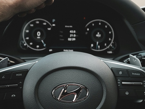 interior view of a Hyundai dashboard and steering wheel in a car
