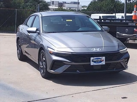 grey 2024 Hyundai elantra sedan parked at the Huffines Hyundai Plano dealership in Plano, TX