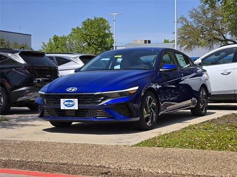 blue 2025 Hyundai Elantra sedan parked at the Huffines Hyundai Plano dealership in Plano, TX
